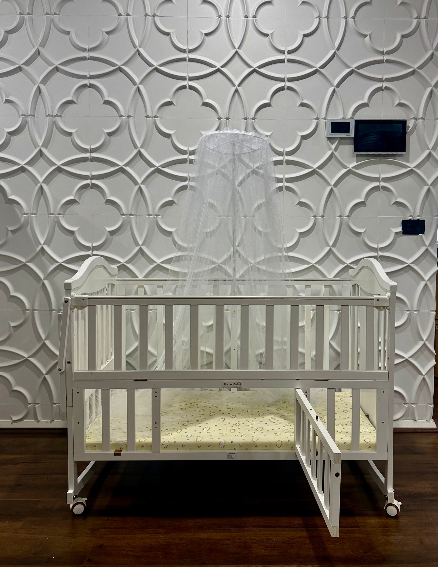 White wooden baby cot
