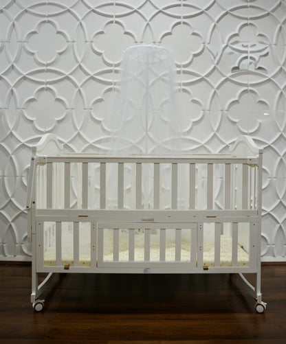 White wooden baby cot